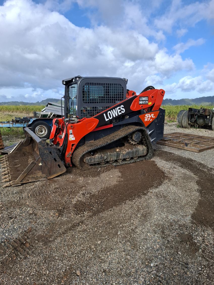 Lowes Earthmoving Kubota SVL97-2 tracked skid steer with four-in-one bucket at Murwillumbah NSW